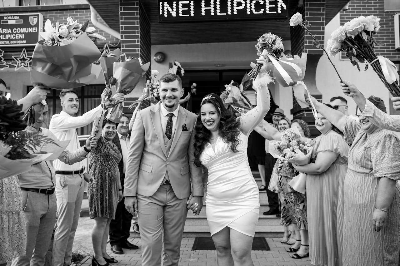gallery-2 Lively outdoor wedding ceremony in Romania with happy couple and guests.